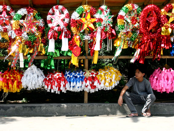 A vendor's stall with various parol designs